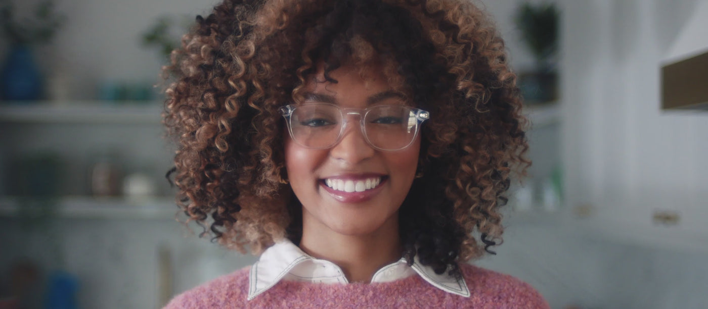 Group of people wearing glasses placing magnetic tops with patterns on Tops of the frames